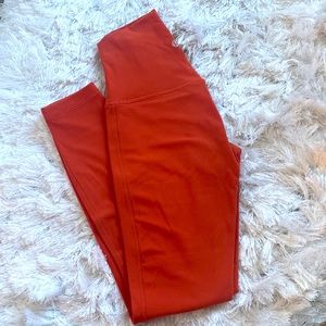 Lululemon orange high waisted tights! Size 2 but also fits a 4 3/4 length